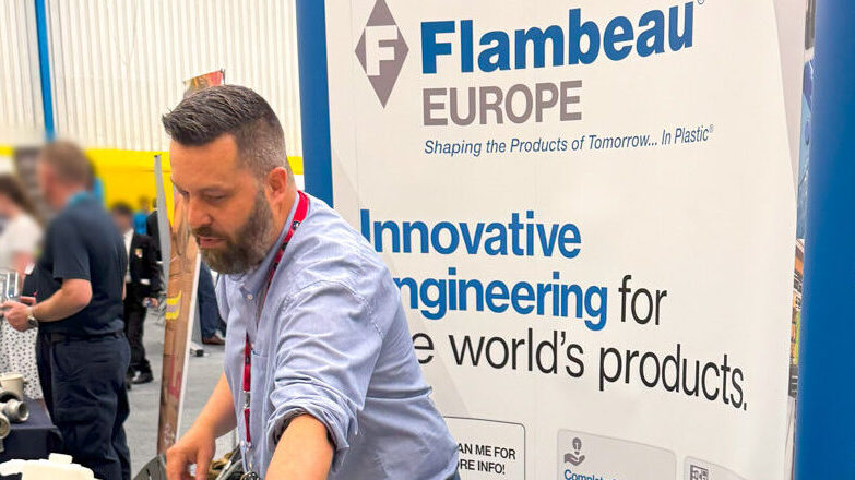 Flambeau Europe employee attending careers fair, explaining injection moulding career paths